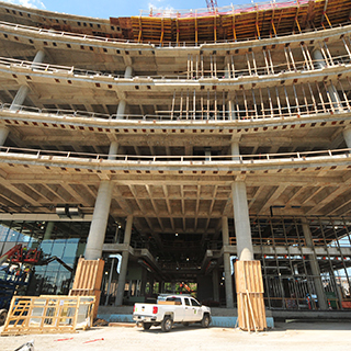 A six-story building structure without exterior construction.